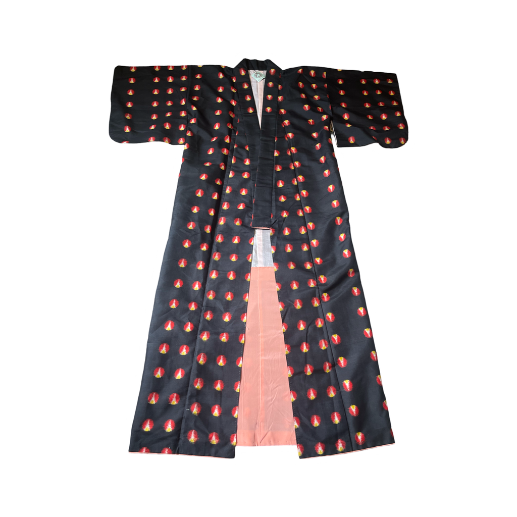 Black with a repetitive oval pattern silk kasuri kimono